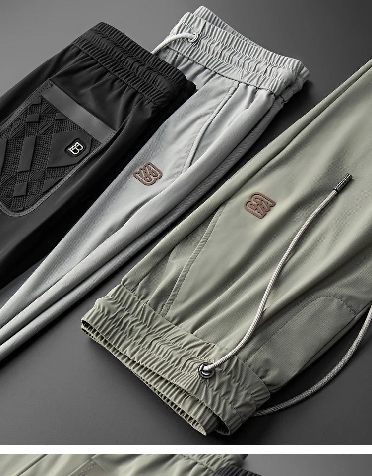 Luxury brand men's letter printed casual pants 2024 summer new ice silk comfortable and breathable casual pocket sports pants