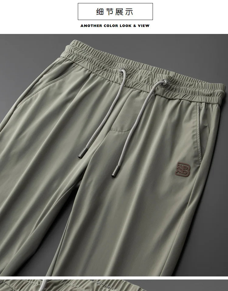 Luxury brand men's letter printed casual pants 2024 summer new ice silk comfortable and breathable casual pocket sports pants