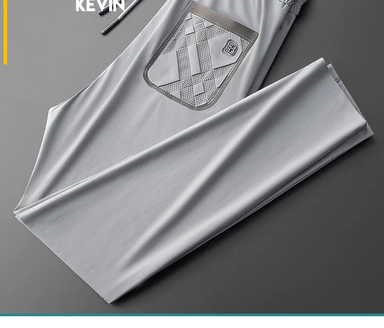 Luxury brand men's letter printed casual pants 2024 summer new ice silk comfortable and breathable casual pocket sports pants