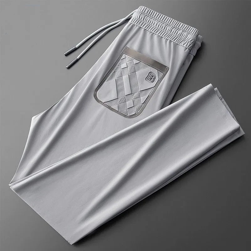 Luxury brand men's letter printed casual pants 2024 summer new ice silk comfortable and breathable casual pocket sports pants