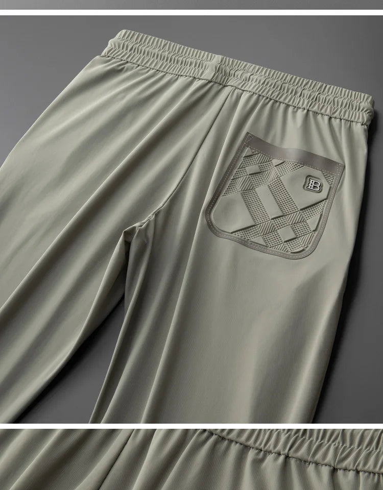 Luxury brand men's letter printed casual pants 2024 summer new ice silk comfortable and breathable casual pocket sports pants