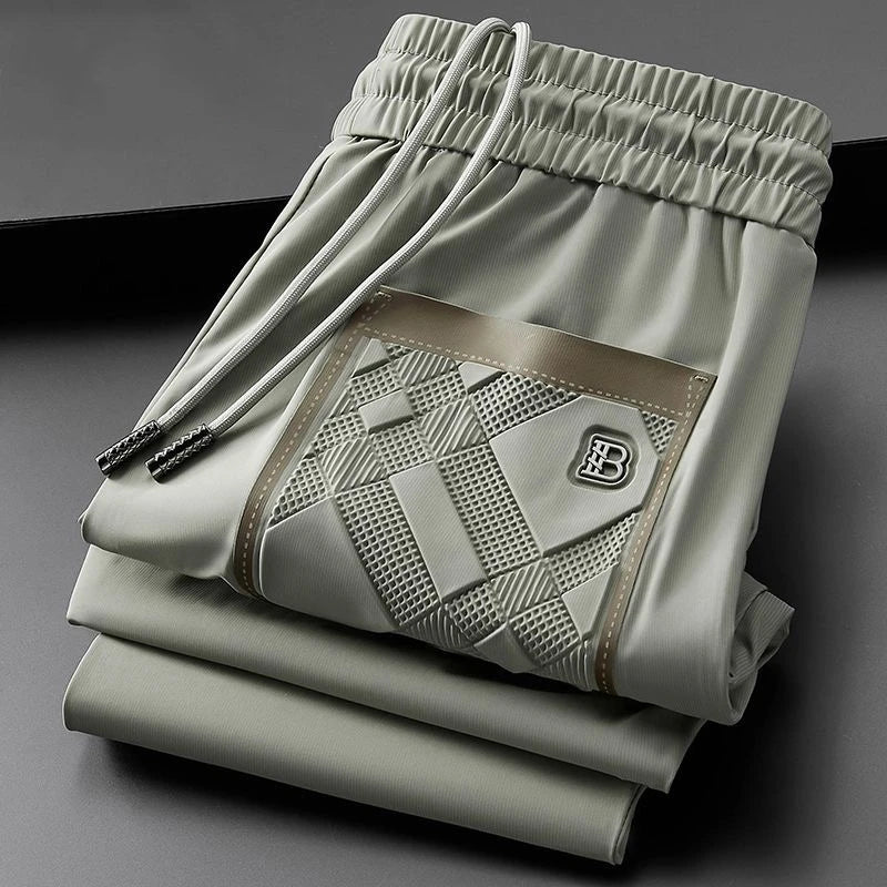 Luxury brand men's letter printed casual pants 2024 summer new ice silk comfortable and breathable casual pocket sports pants