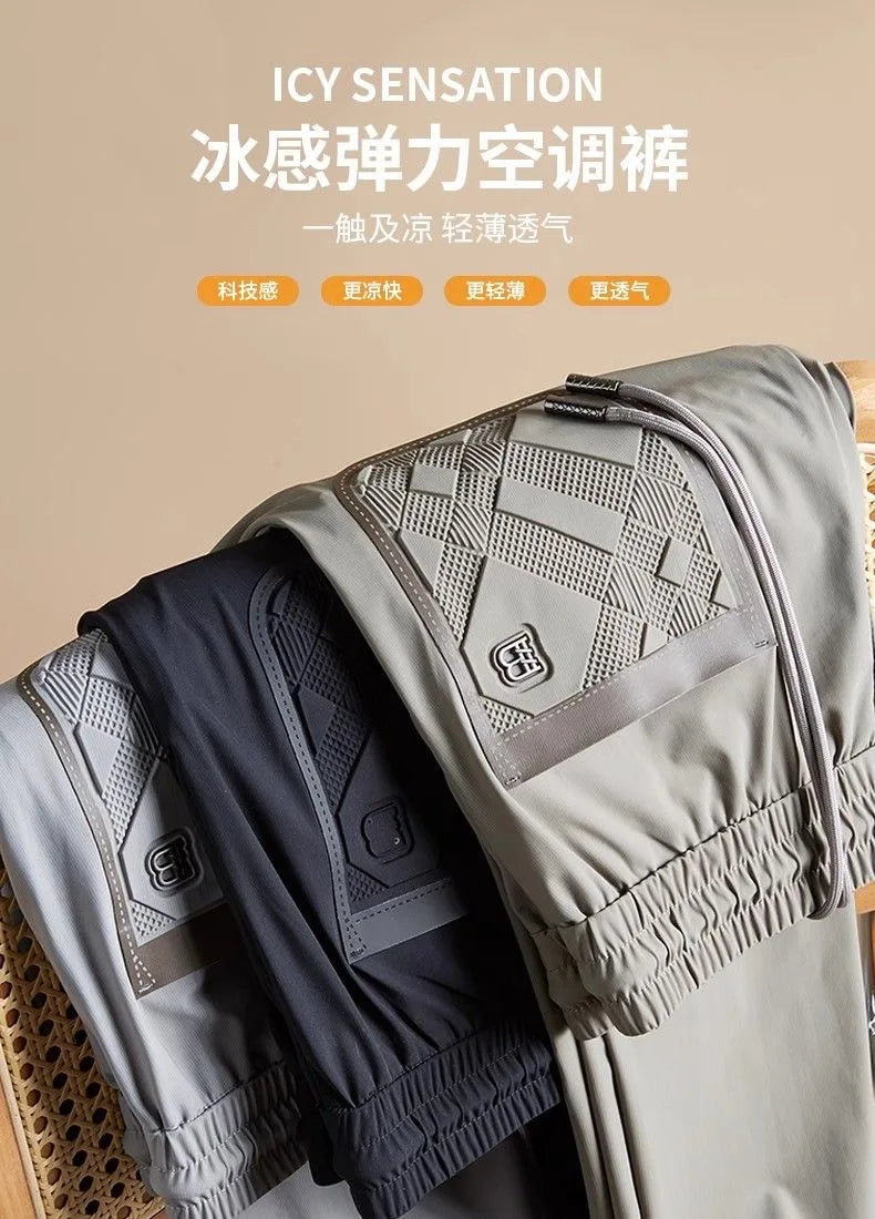 Luxury brand men's letter printed casual pants 2024 summer new ice silk comfortable and breathable casual pocket sports pants